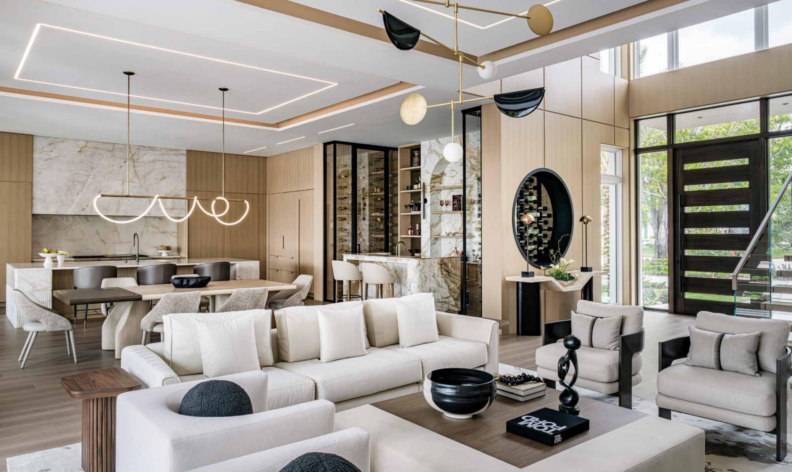 Living room, kitchen and custom bamboo fluted stone bar